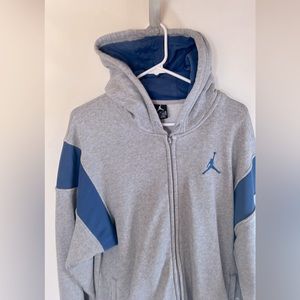 Men’s blue and gray Jordans hoodie, size medium